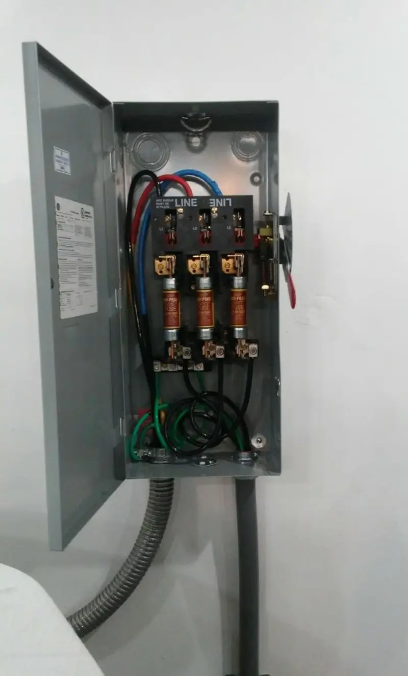 Three-phase disconnect switch installed for Smoke Detector Installation in Orange